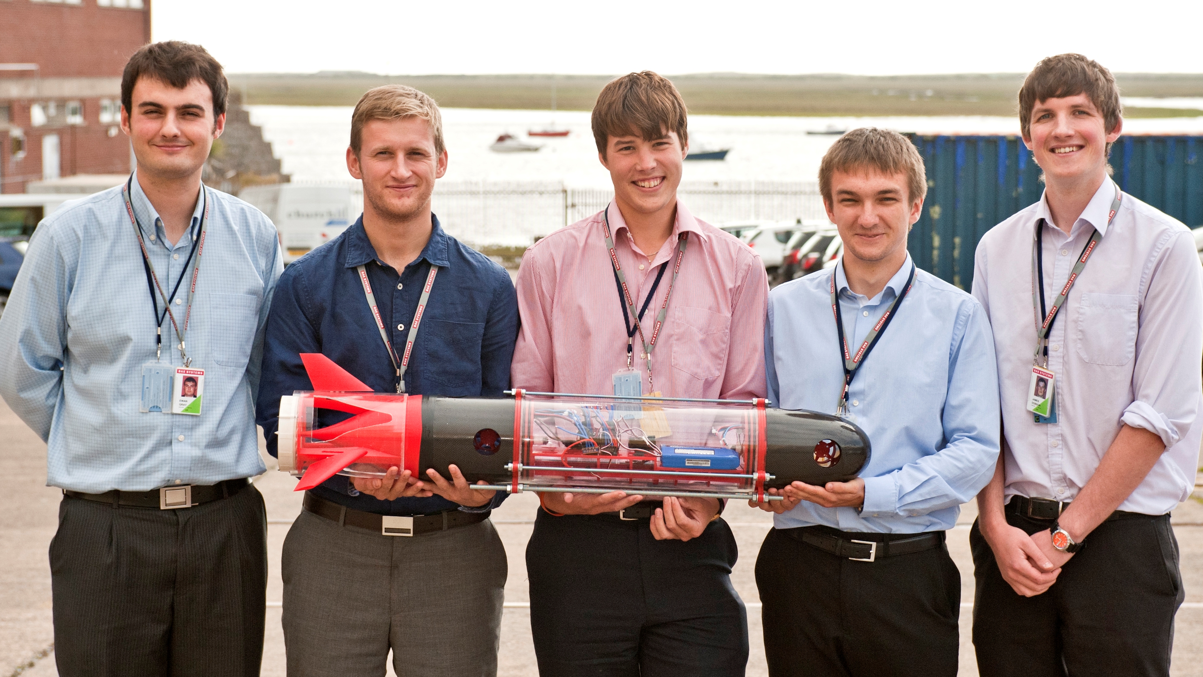 Five of the interns with their demo submarine