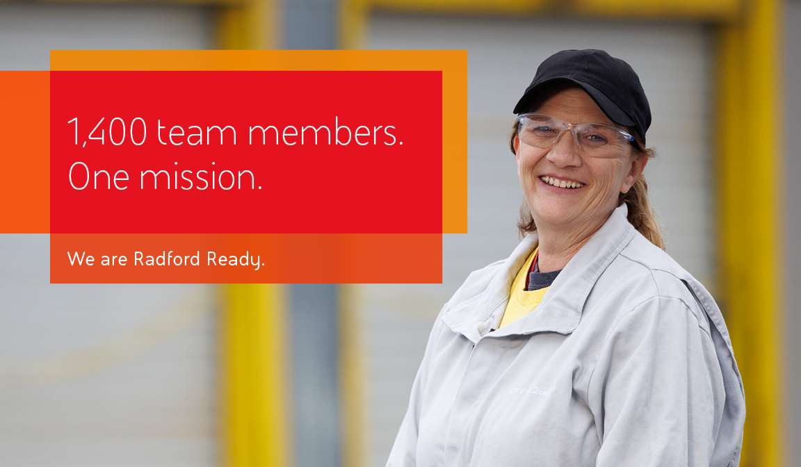 "1,400 team members. One mission. We are Radford Ready" next to a woman in safety glasses