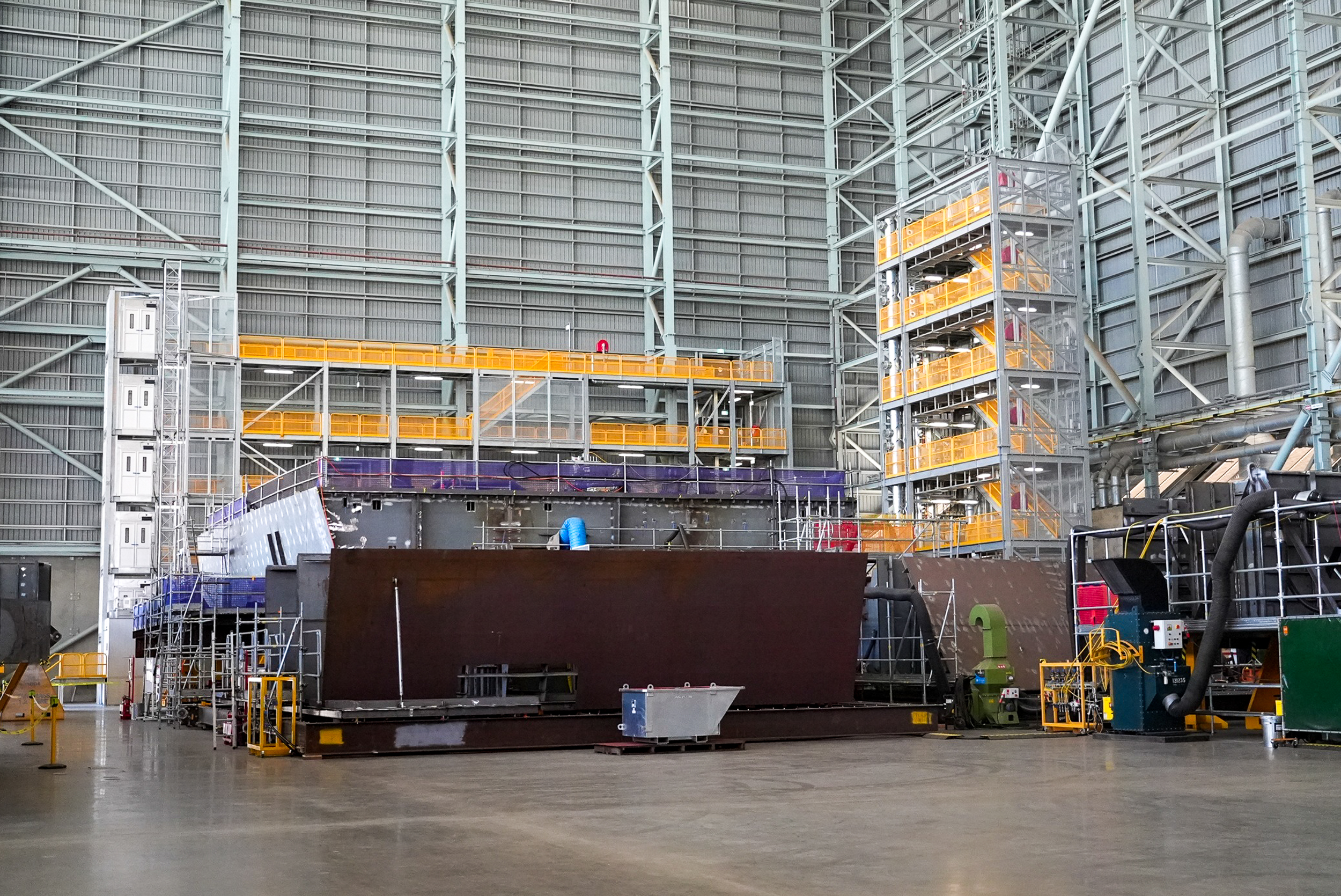 Entrance to the OST from inside Building 22. Shipbuilders will use the yellow walkways and stairs to directly access NUSHIP Hunter's decks while it's under construction.