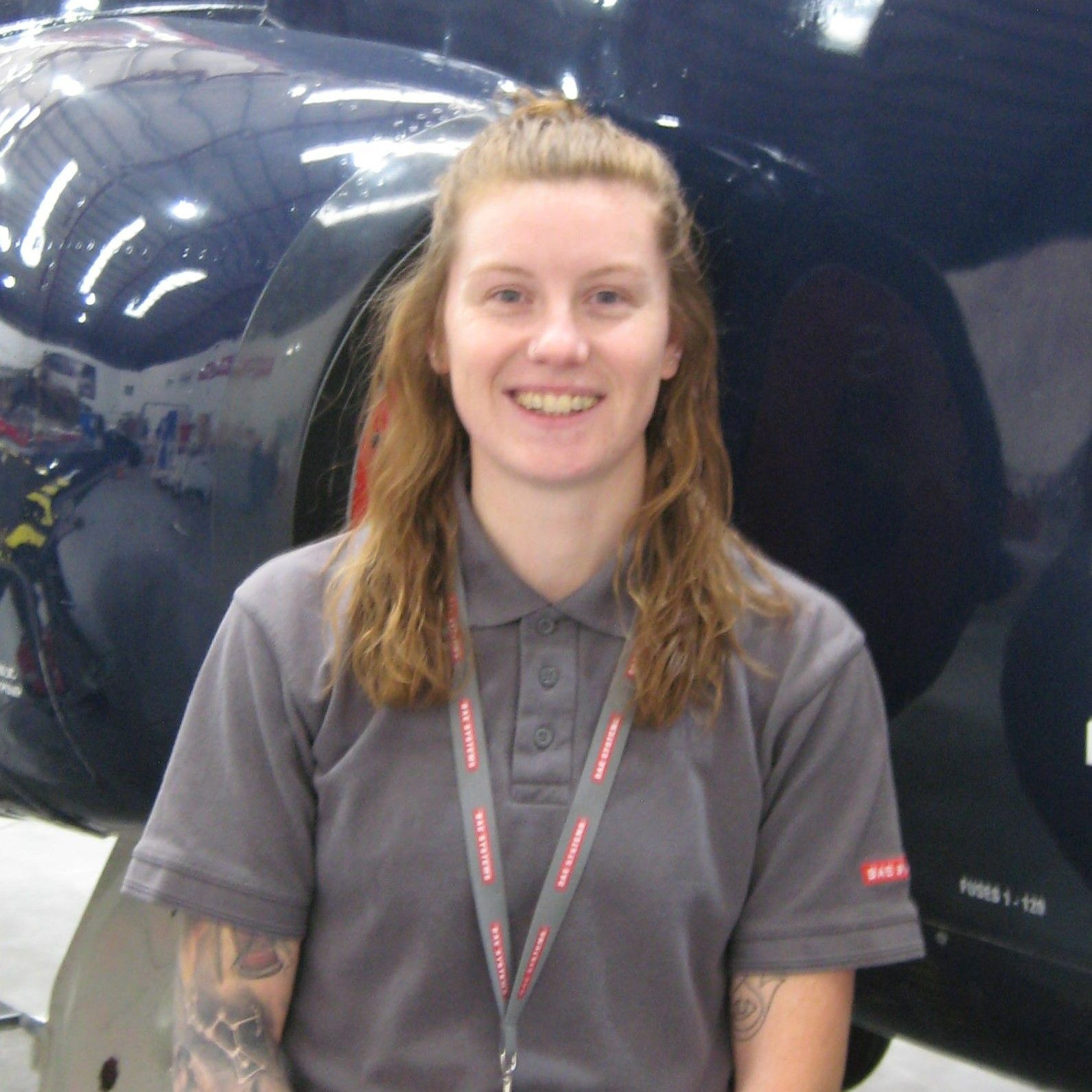Molly in front of Hawk aircraft at Humberside Aircraft Maintenance Academy