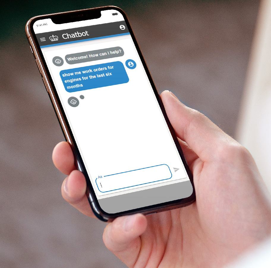Phone in hand showing natural language processing ‘chatbot’ interface