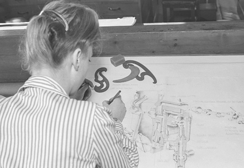 Draughtswoman working on technical drawings, September 1942.