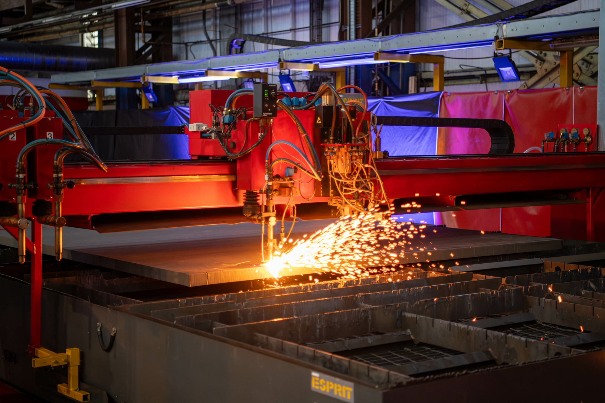 Image of cutting machine making first steel cut on HMS King George VI