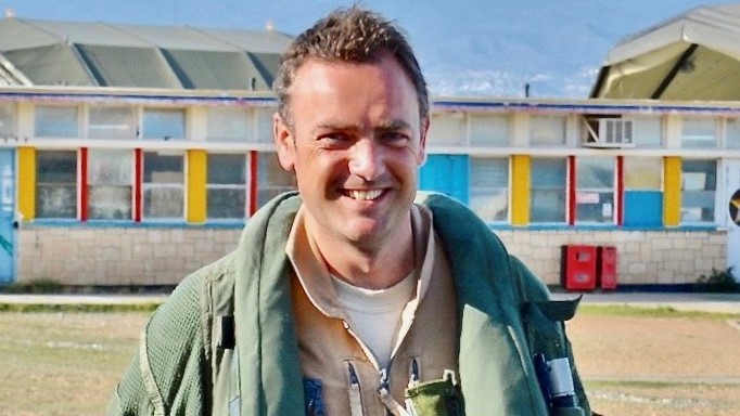 Former Typhoon pilot Mike Sutton walking to aircraft