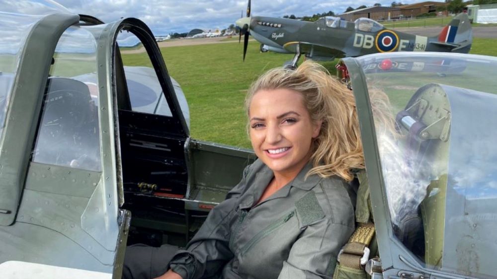 Liv Perry in a Spitfire 