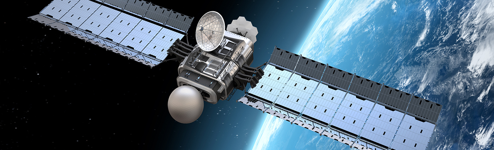 Communications satellite in orbit, an example of space-based equipment that requires radiation-hardened electronics like BAE Systems has been developing for over 50 years.