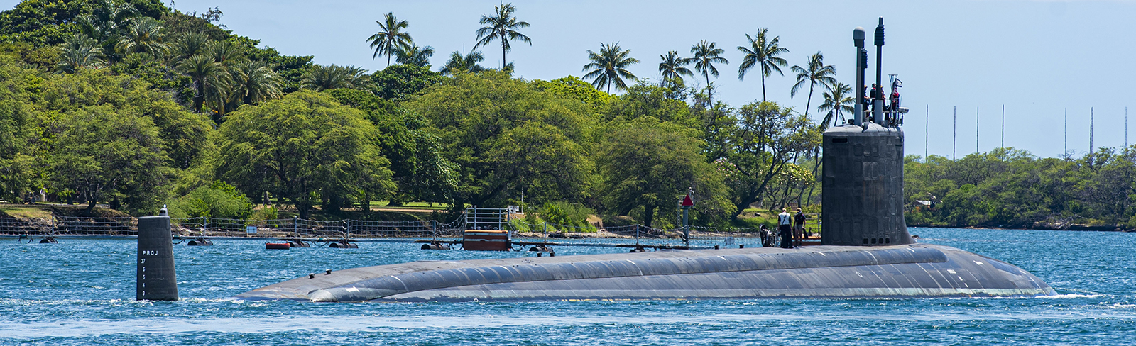 The Virginia-class fast-attack submarine USS Missouri (SSN 780) departs Pearl Harbor Naval Shipyard.