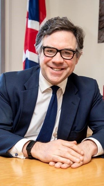 A portrait of Jeremy Quin MP, Minister for Defence Procurement, UK