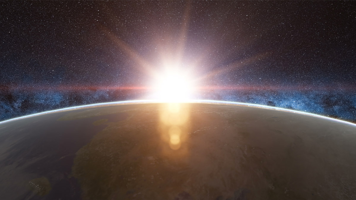 The Sun rising over the Earth as seen from space