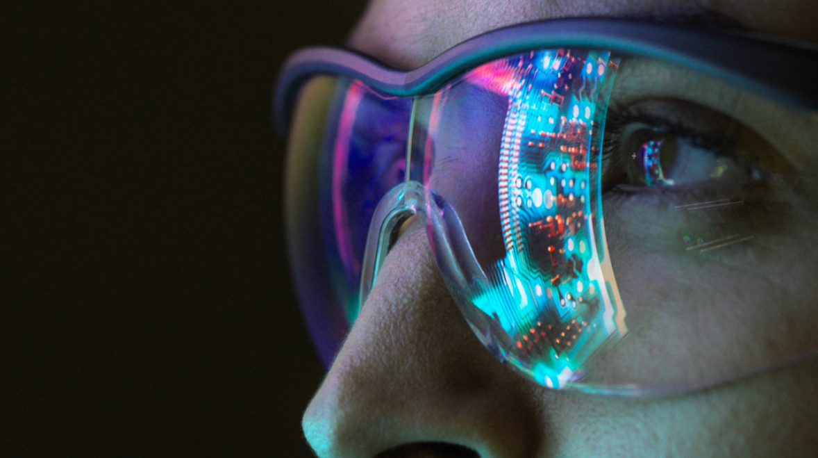 A digital image showing a lady looking at data