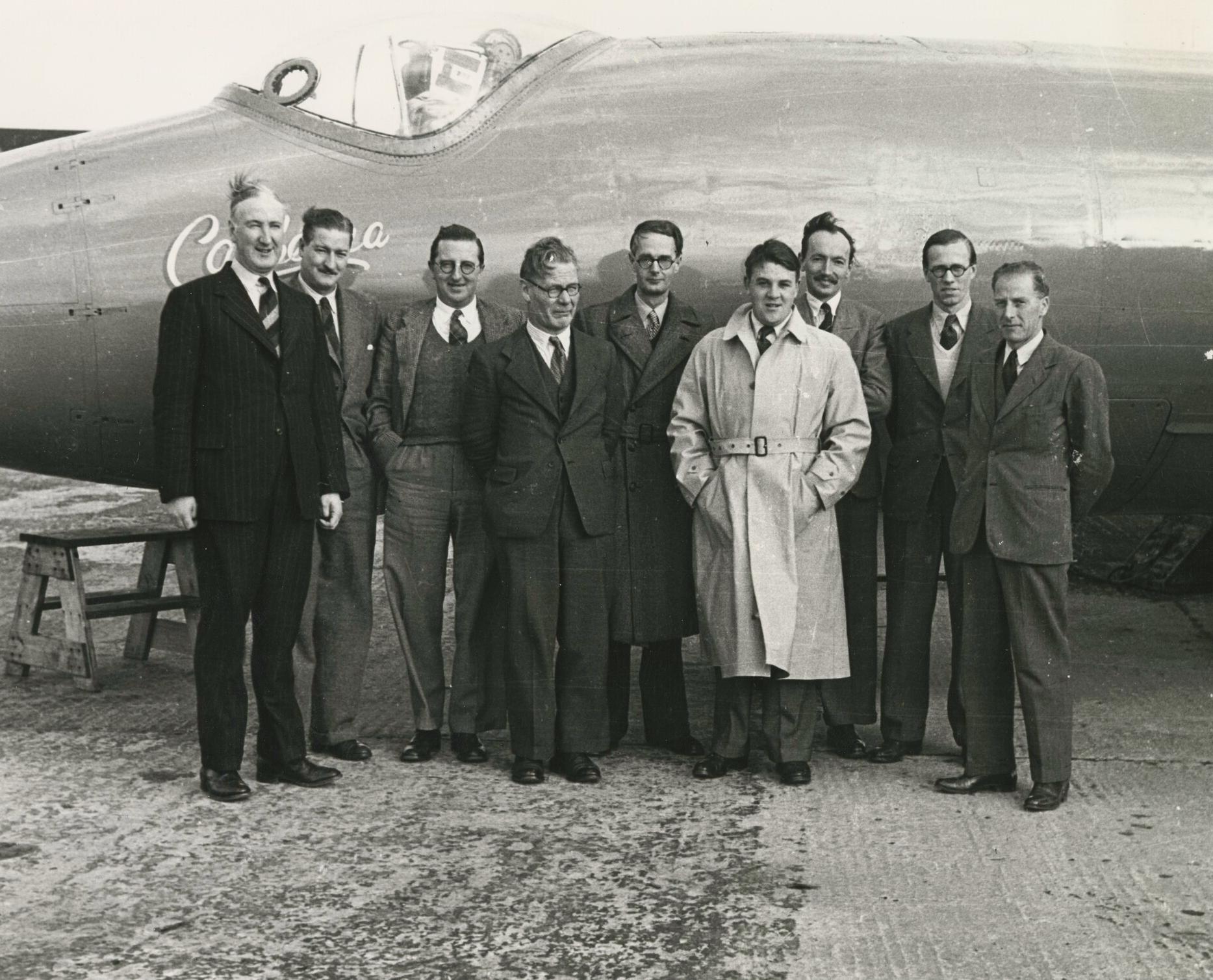 Original English Electric Canberra team standing in front of a Canberra aircraft.