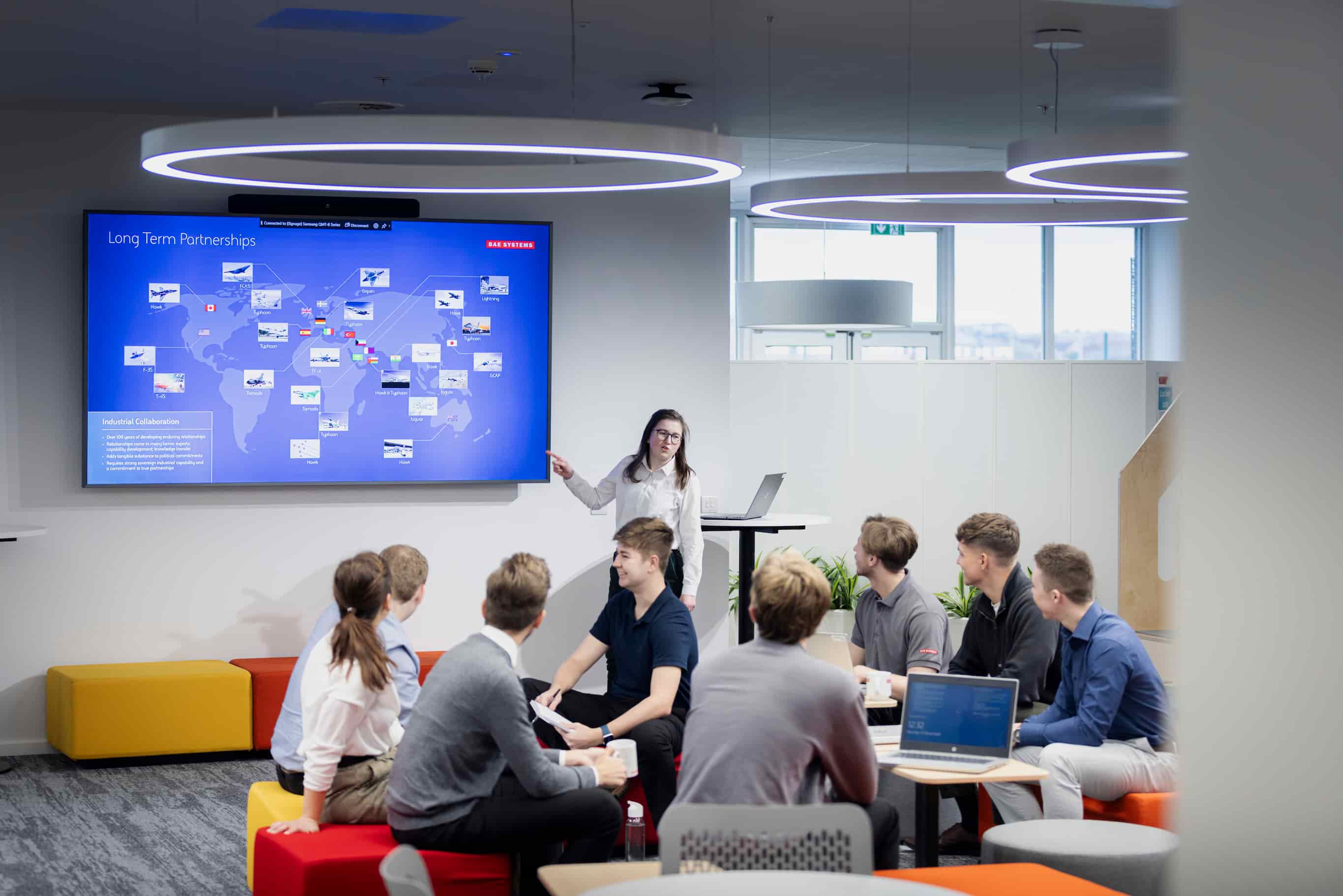 Young people breaking into smaller groups for discussion