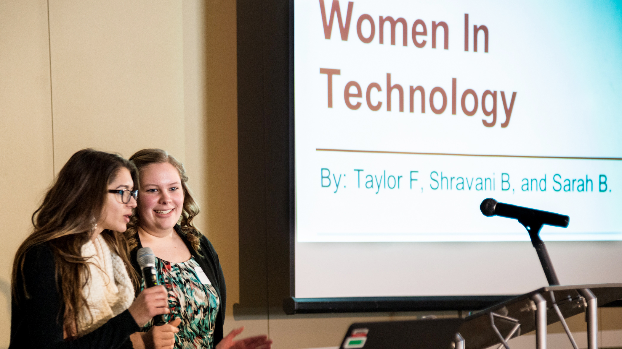 Sarah Burgess of Pinkerton Academy and Taylor Frothingham of Nashua North High School tell attendees about their journey through the program