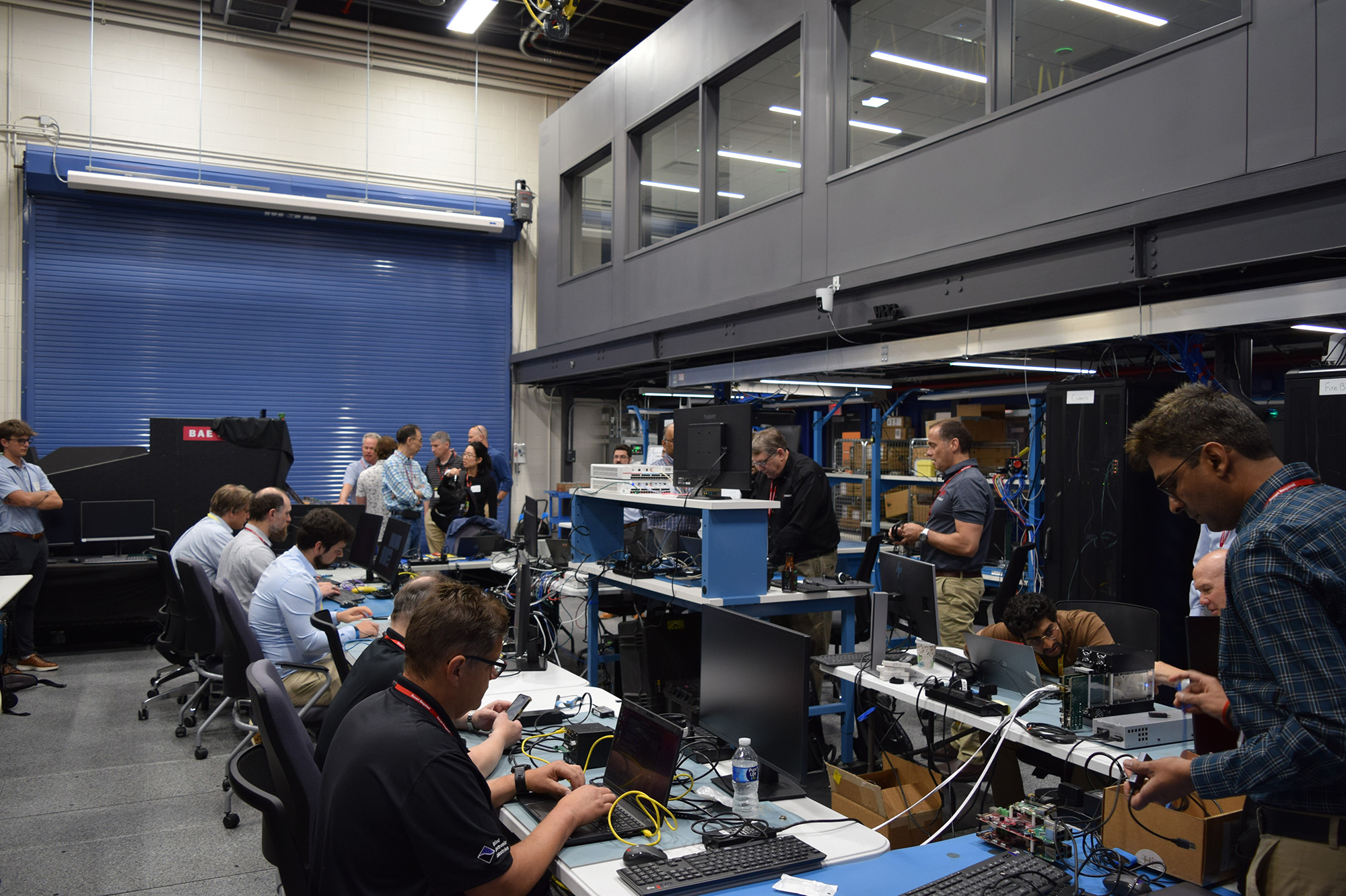 Team works together during plugfest event