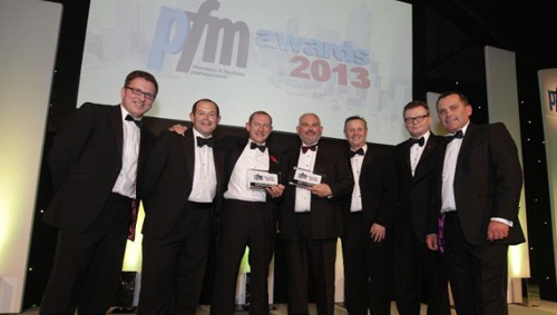 BAE Systems' MAI business and EMCOR receive their award for the “Partners in Facilities Management--Corporate” category award at the 2013 Premises and Facilities Management (PFM).