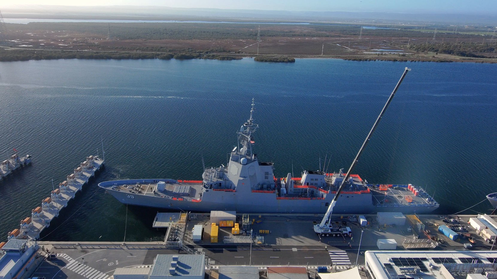 HMAS Hobart docked at Osborne Naval Shipyard for its Destroyer Capability Enhancement (DCE) program upgrades.