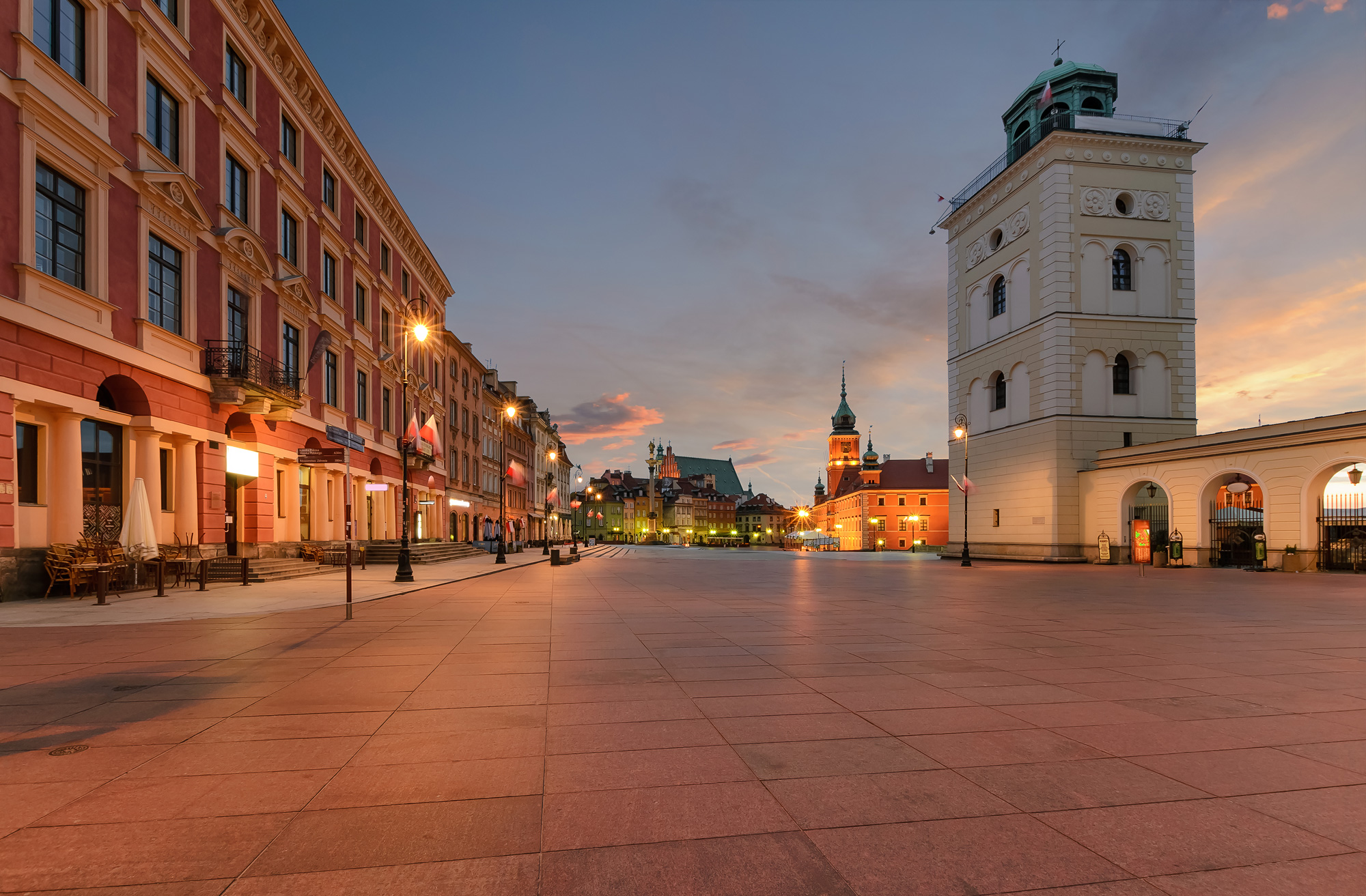 Royal castle and old town square at sunrise in Poland - image by Velishchuk