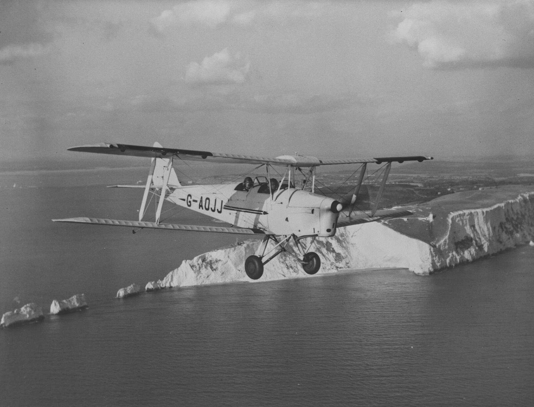 de Havilland DH.82 Tiger Moth flying over the Needles.