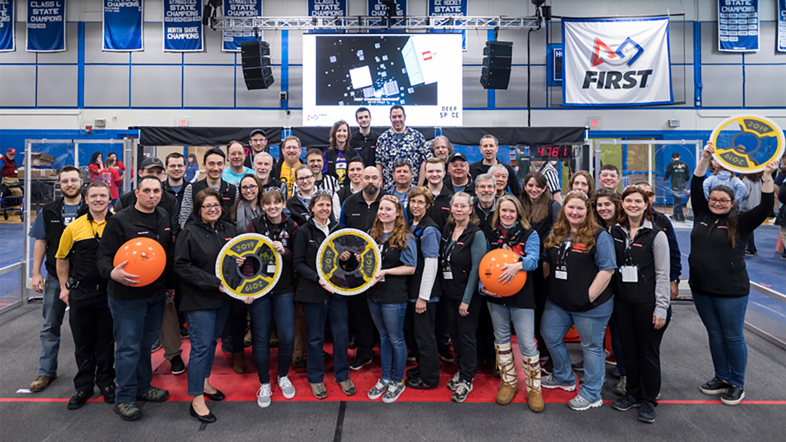 Throughout the year, employees volunteer with a wide-range of community, veteran and military serving organizations, and STEM education organizations. Activities range from giving career talks at a local Girls Who Code Club or Boys and Girls Club, mentoring a FIRST Robotics team, cleaning up a local school, to conducting mock interviews for veterans, and more.