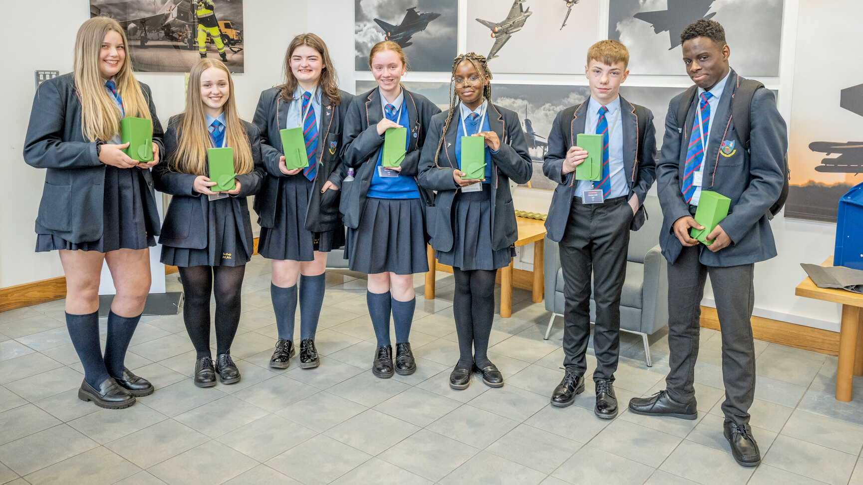 Students and their winning seed dispenser product