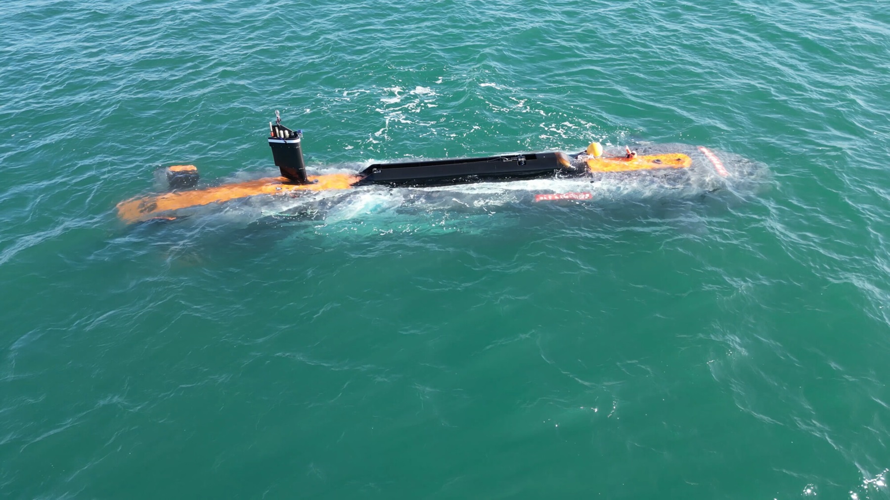 Image of Herne alongside in the water