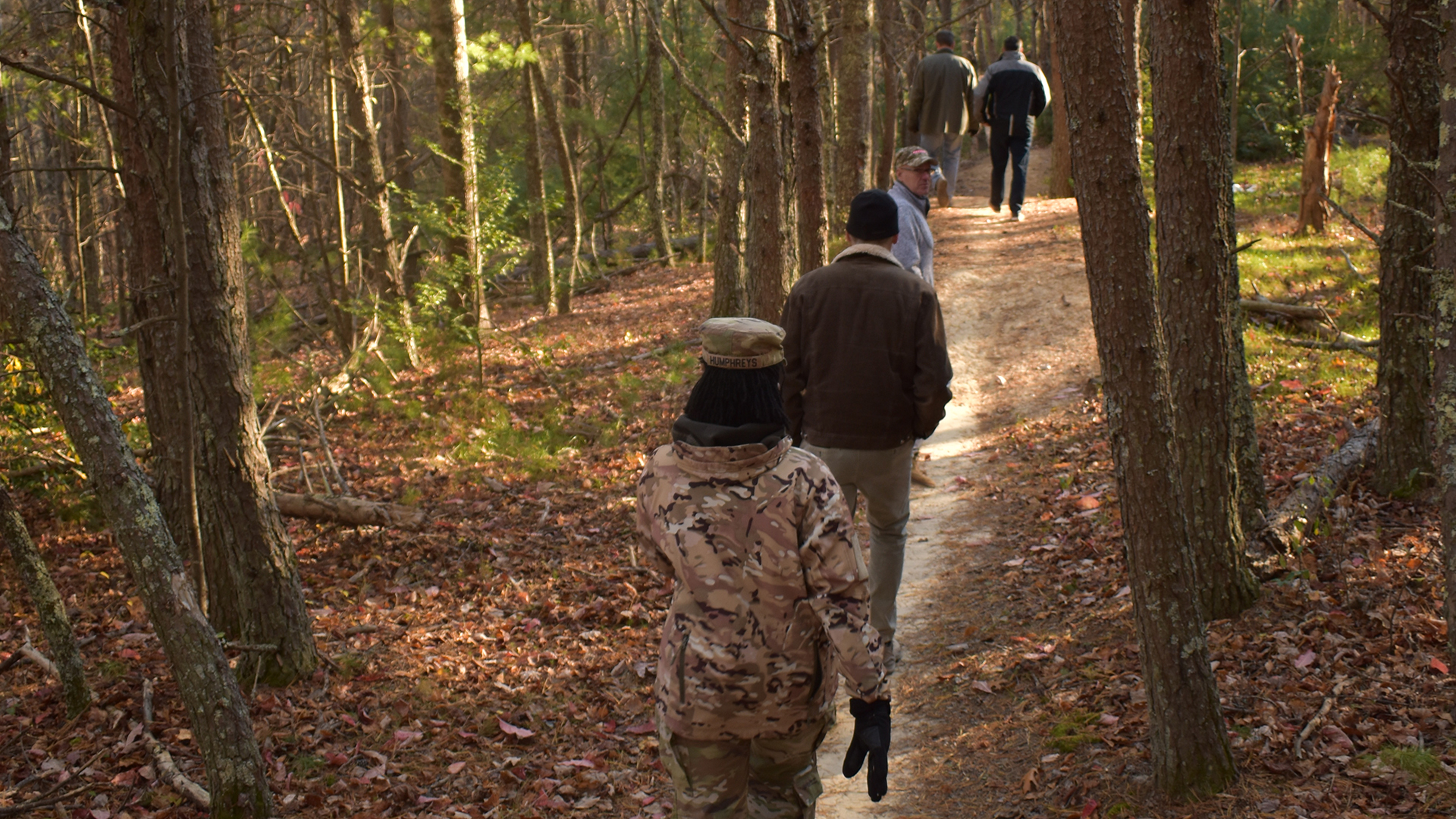 U.S. Army and BAE Systems Leadership walking the trail at Brush Mountain Park