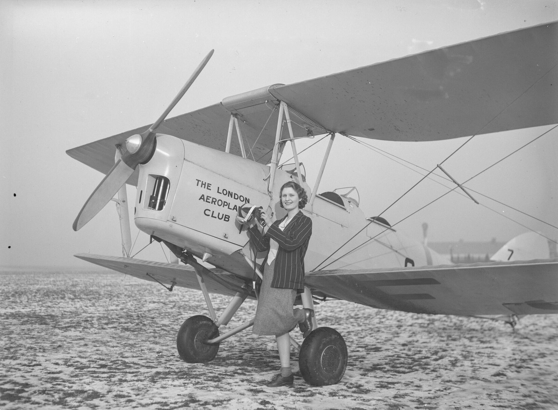 A de Havilland DH.82 Tiger Moth of the London Aeroplane Club with female member, 6th January 1939.