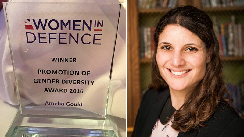 Image of winner and her award