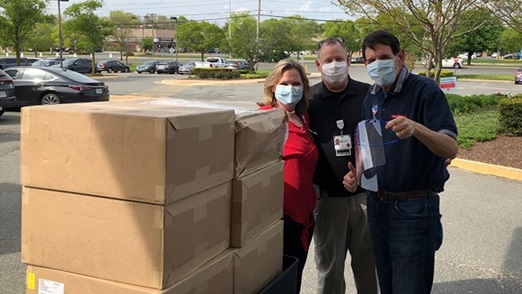 Site Executive Steve Danziger delivers face shields to Prince William Hospital in Manassas, Virginia.