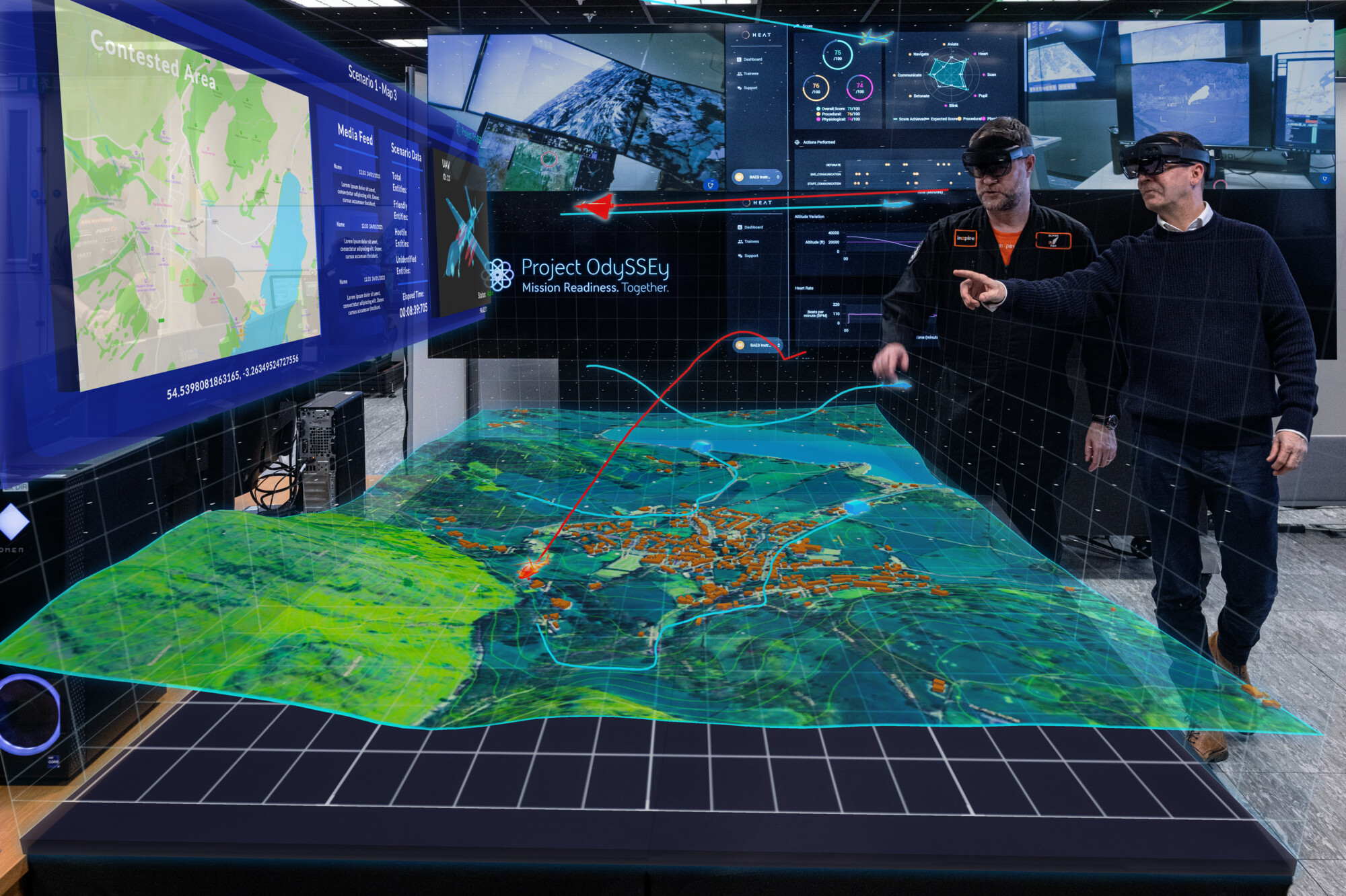 Two people wearing virtual reality goggles looking at the table top mission planning Project OdySSEy