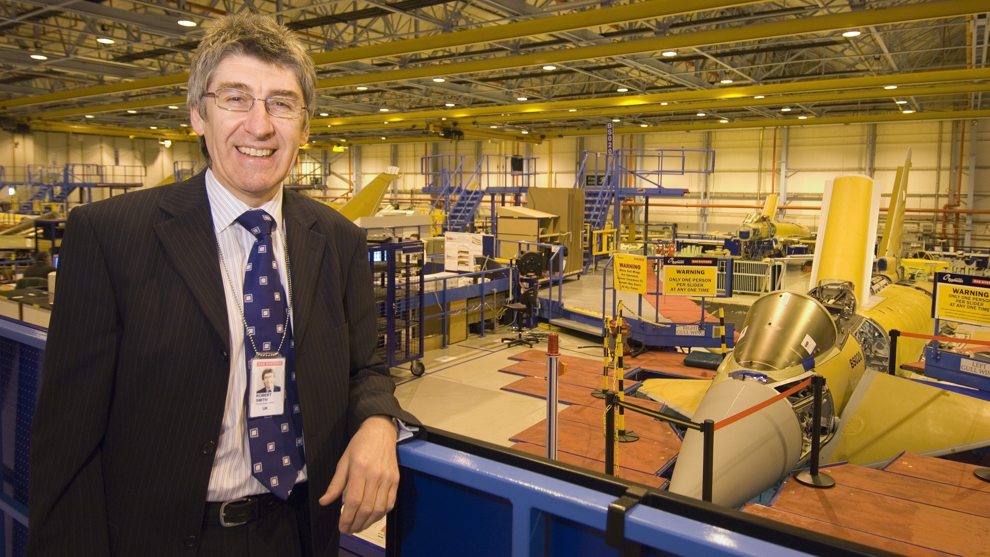 Bob Smith stands on a platform in front of the UK Typhoon final assembly line in Lancashire, UK. 