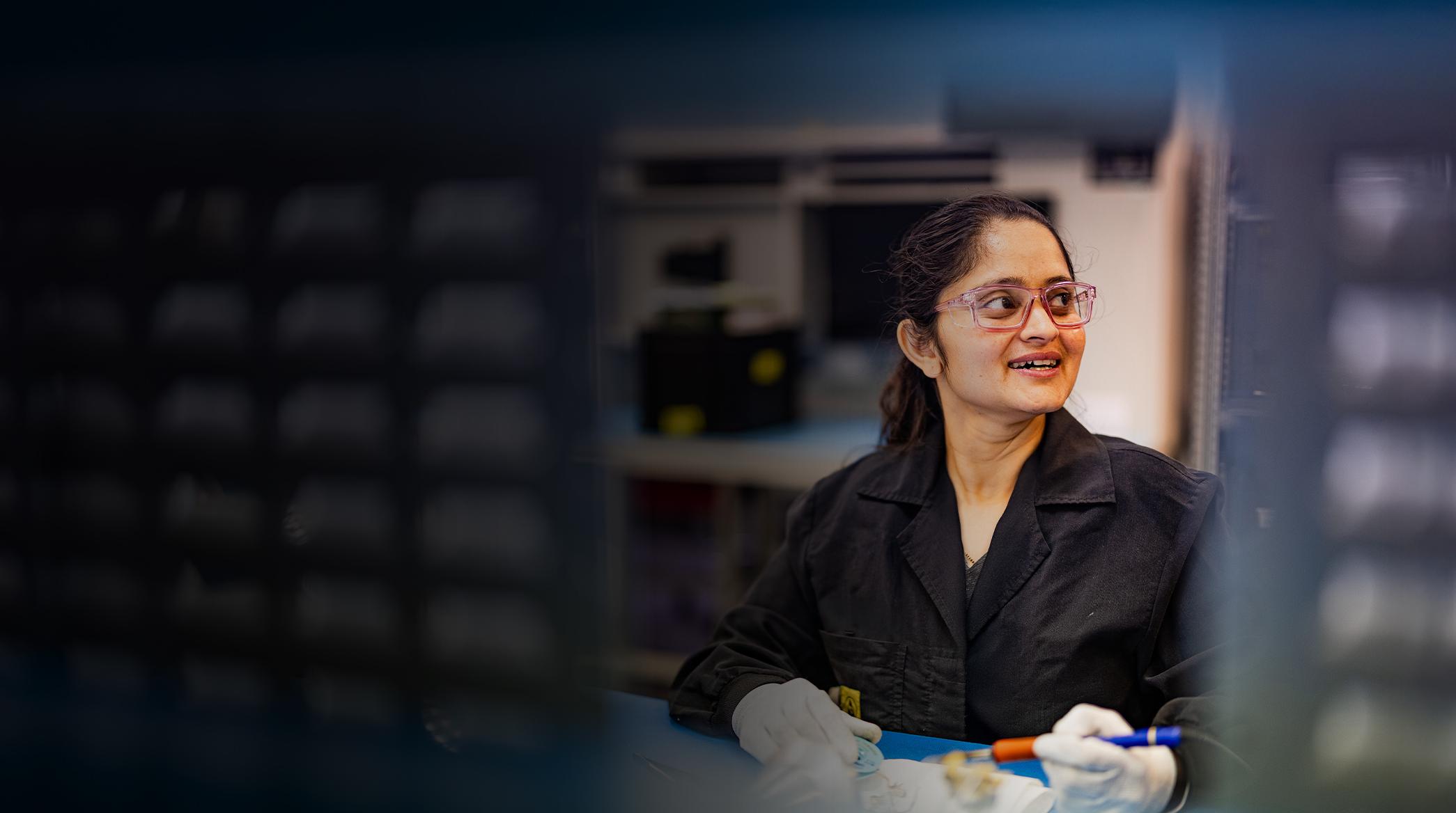 Female employee looking into distance