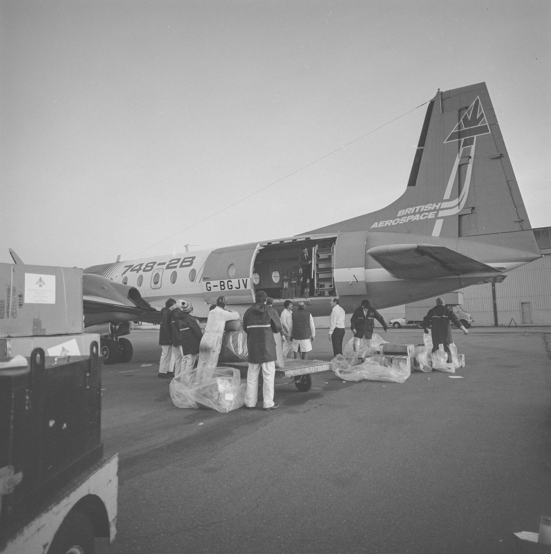 British Aerospace HS748 Srs.2B (G-BGJV) at Hatfield, being loaded with relief for victims of the 1983 Erzurum, Turkey earthquake. November 1983.