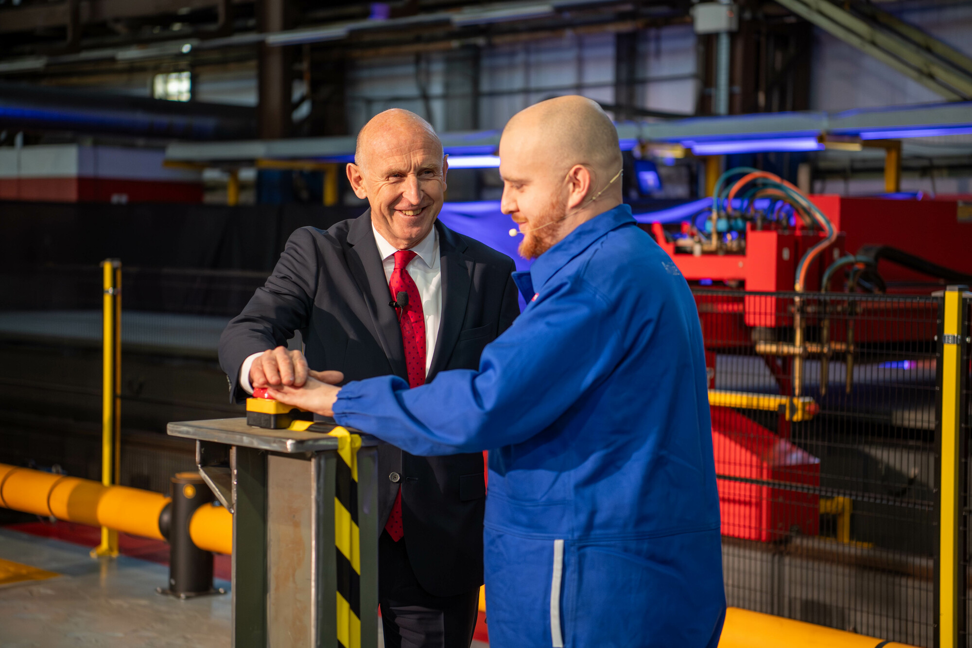 After the button pusing, a cutting machine making first steel cut on HMS King George VI