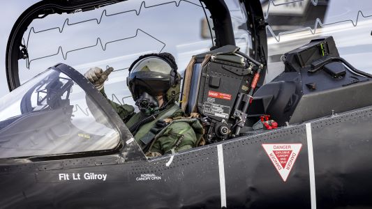 An RAF Hawk pilot gives a thumbs up.