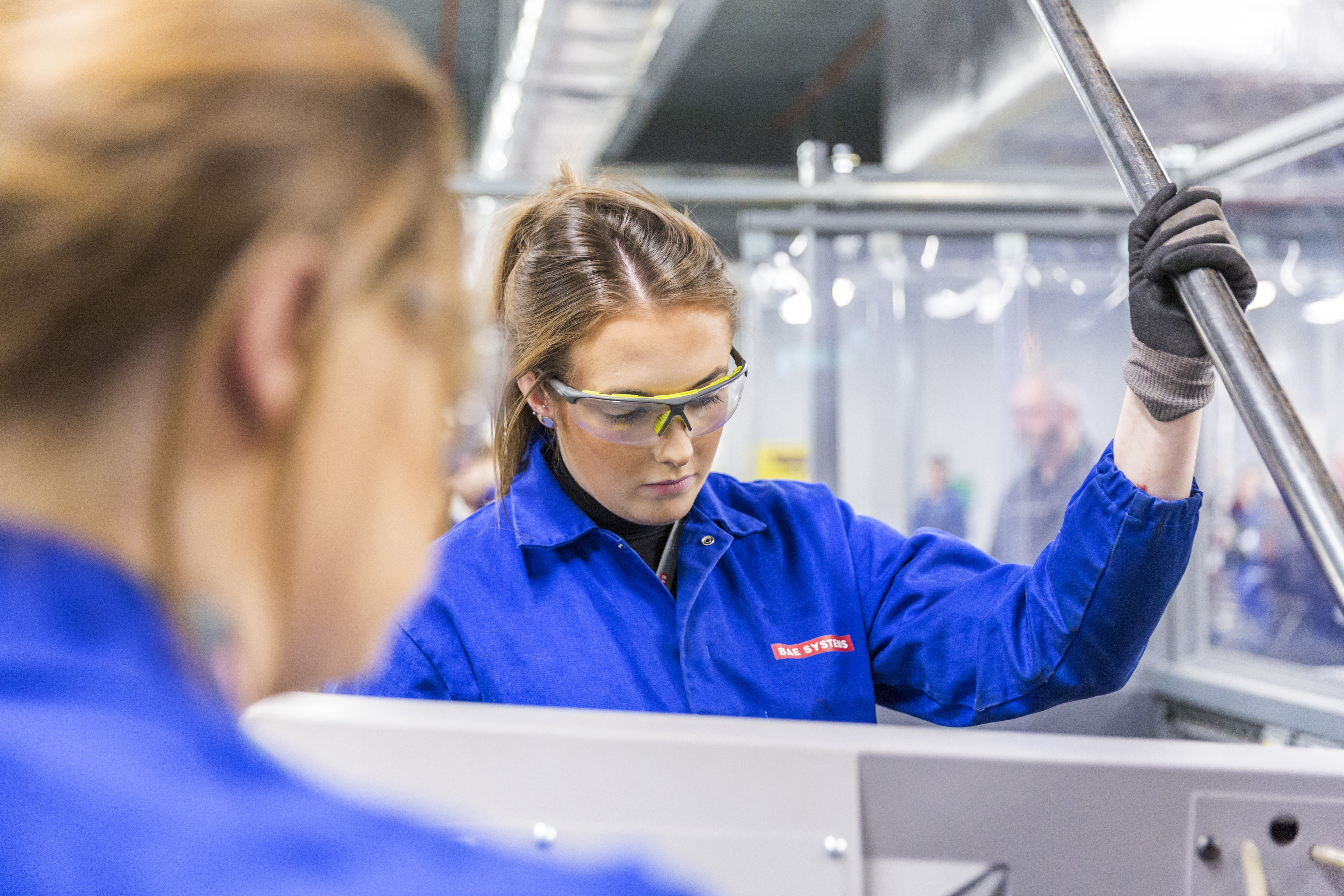 A BAE Systems submarine engineering professional at work in Barrow