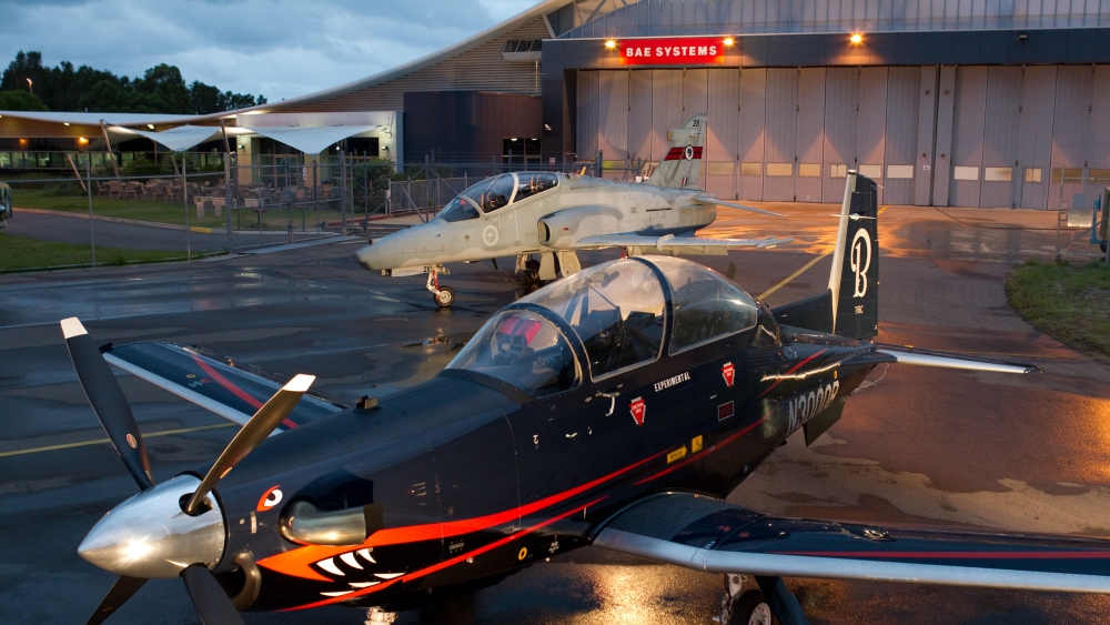 T-6C in front of hangar