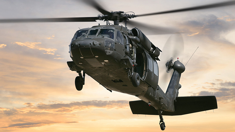 A black hawk helicopter flying