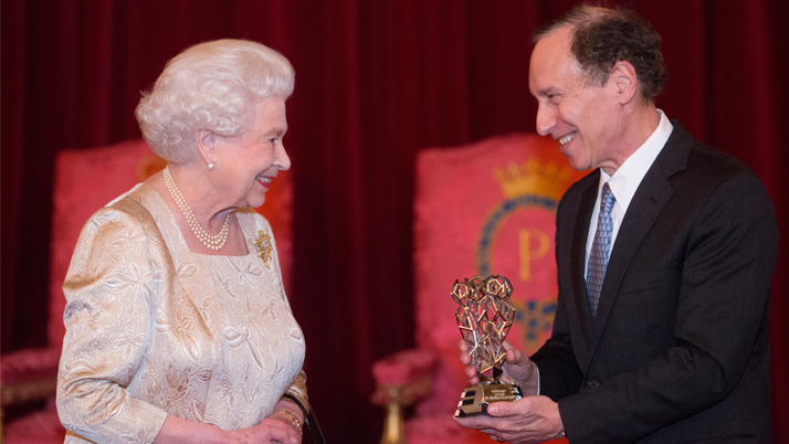 Queen Elizabeth presenting Dr. Langer with his trophy