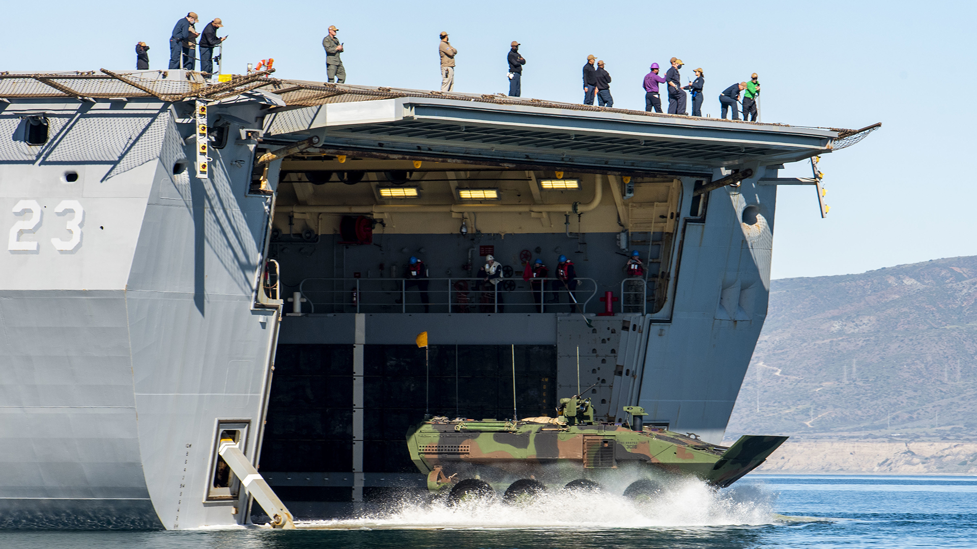 An Amphibious Combat Vehicle (ACV) with the 3rd Assault Amphibian Battalion, 1st Marine Division disembarks the well deck of amphibious transport dock ship USS Anchorage (LPD 23) during waterborne training in the Pacific Ocean. (U.S. Navy Photo) 