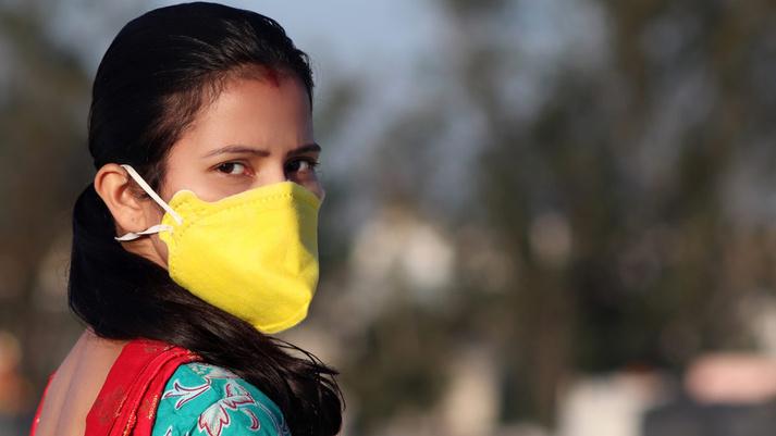 Image showing woman wearing a protective face mask Image showing woman wearing a protective face mask