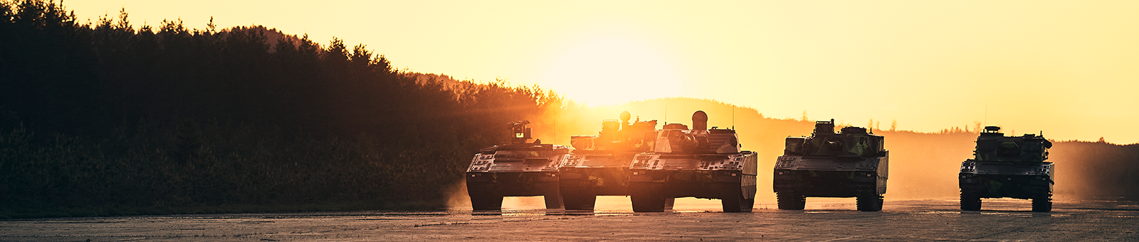 CV90 Family lined up at sunset