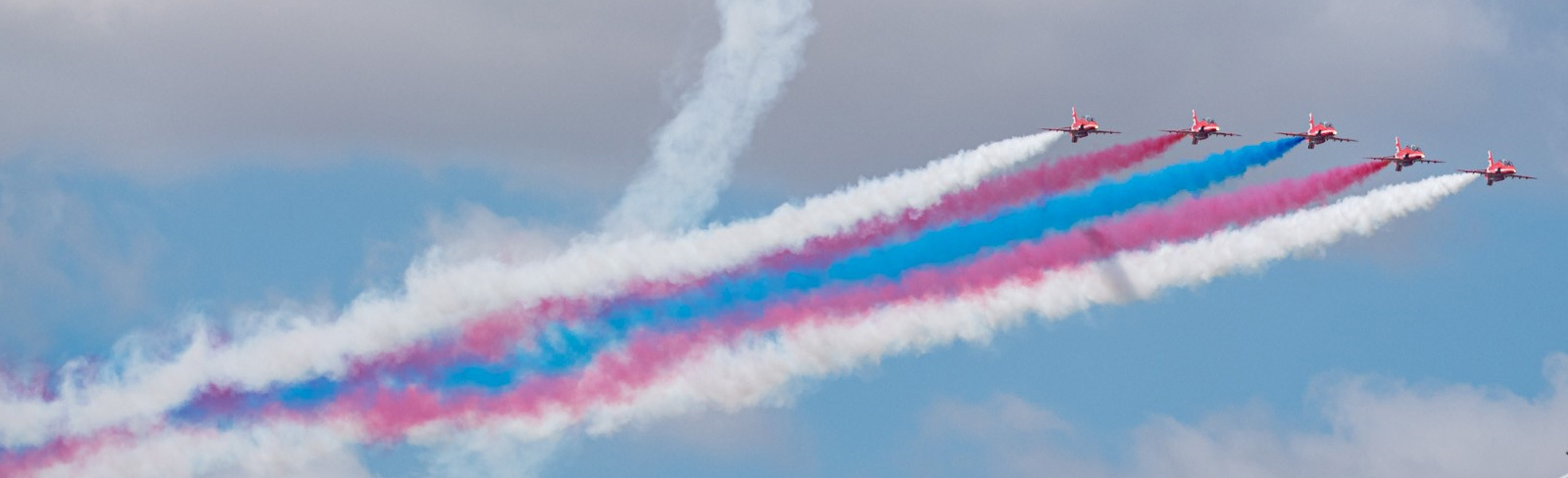 The Red Arrows Hawks flying in formation at the Royal International Air Tattoo in 2022