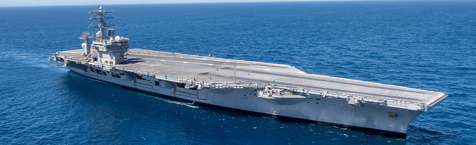 Large U.S. Navy aircraft carrier called USS Nimitz CVN 68 conducting routine operations in Pacific Ocean (Photo courtesy of Petty Officer 3rd Class Samuel Osborn)