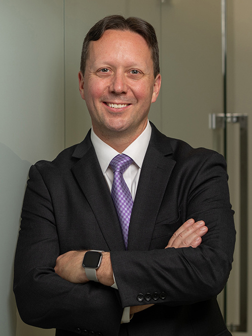 Jeremy Tondreault, president of Platforms & Services, smiles in an office environment with his arms crossed. Jeremy Tondreault, president of Platforms & Services, smiles in an office environment with his arms crossed.